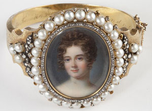 Victorian diamond and pearl portrait bangle bracelet depicting female portraits on ivory. Image courtesy of Leland Little Auction & Estate Sales Ltd.